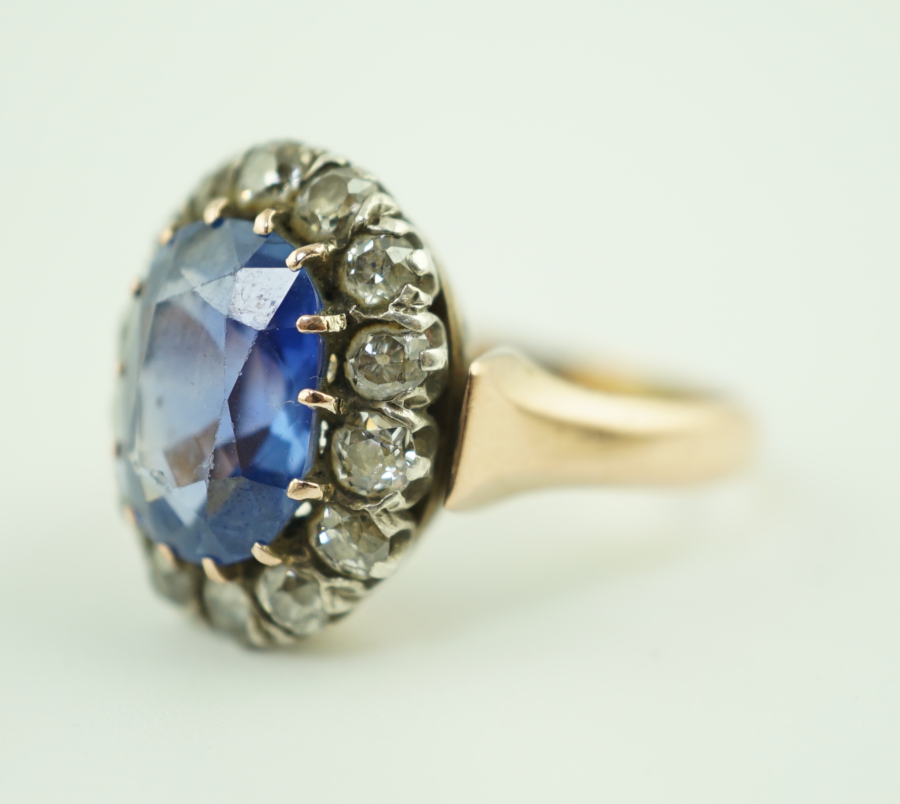 A Victorian gold, sapphire and diamond set oval cluster ring